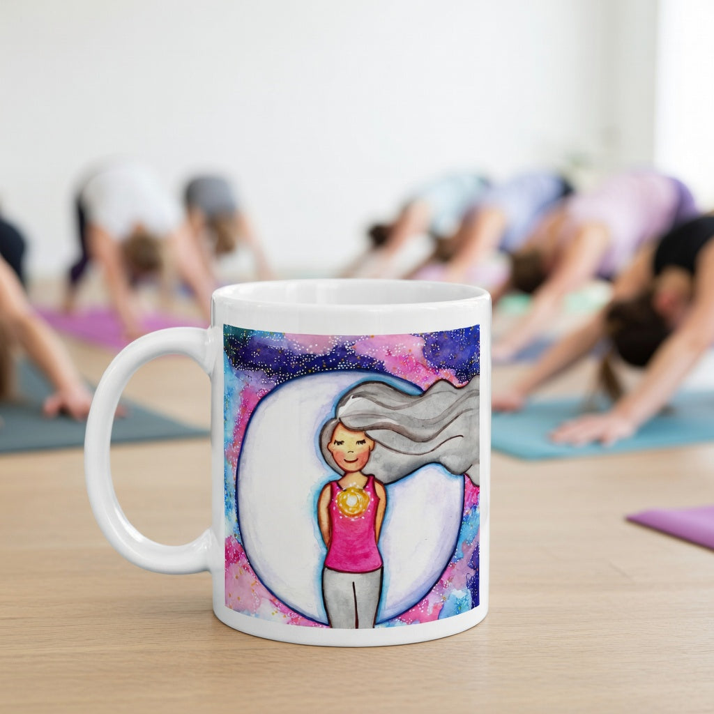 Meditating person with glowing heart chakra at center of chest, symbolizing love, compassion and emotional balance, spiritual design on a mindfulness coffee mug.  The mug is in front of a yoga class doing the downward facing dog posture.